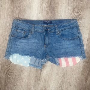 American flag themed pockets made to come past the shorts flor a USA style sz 3